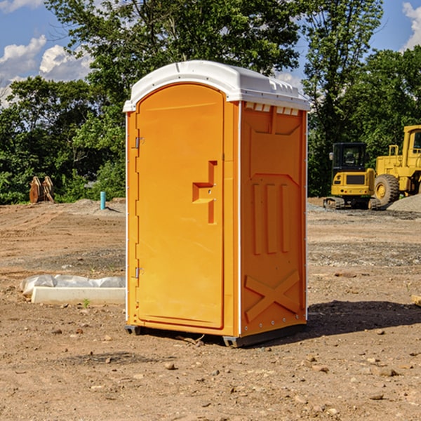 what is the cost difference between standard and deluxe portable restroom rentals in Headland